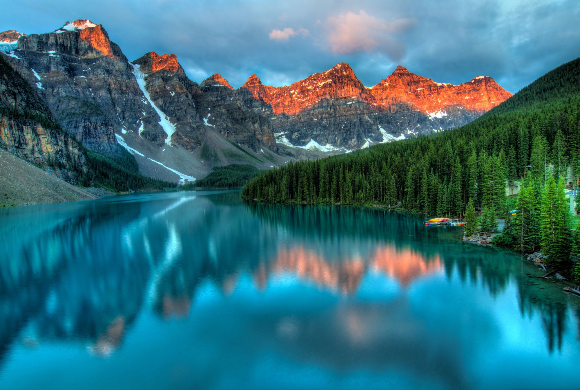 Layered mountains beneath soft evening light